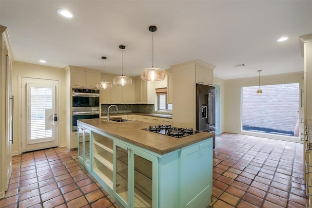 1319 E Brooklake Dr, Houston, TX 77077 - kitchen with tasteful backsplash, a sink, gas cooktop, stainless steel double oven, and high quality fridge