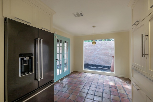 1319 E Brooklake Dr, Houston, TX 77077 - unfurnished dining area featuring baseboards, crown molding, french doors, and visible vents