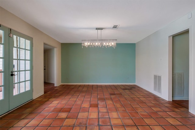 1319 E Brooklake Dr, Houston, TX 77077 - empty room featuring french doors, visible vents, and a chandelier