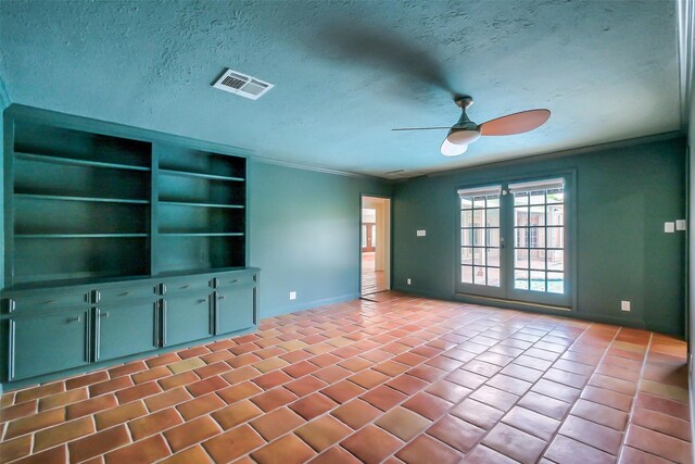 1319 E Brooklake Dr, Houston, TX 77077 - unfurnished living room featuring ceiling fan, baseboards, a textured ceiling, and visible vents