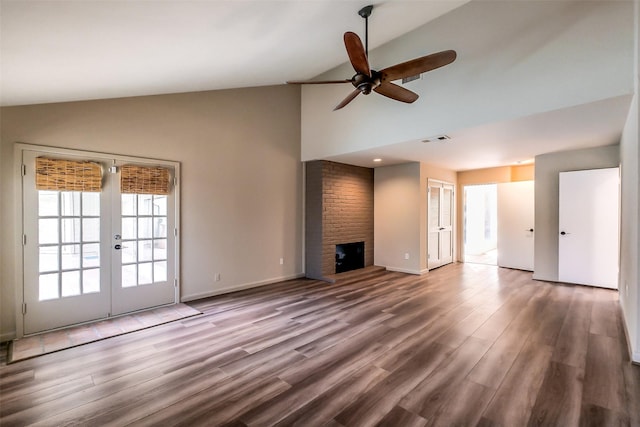1319 E Brooklake Dr, Houston, TX 77077 - unfurnished living room featuring a ceiling fan, french doors, wood finished floors, and visible vents