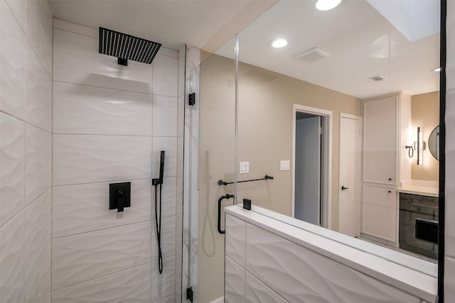 1319 E Brooklake Dr, Houston, TX 77077 - bathroom featuring a shower stall and recessed lighting