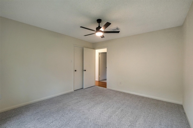 1319 E Brooklake Dr, Houston, TX 77077 - spare room with ceiling fan, carpet floors, visible vents, and baseboards