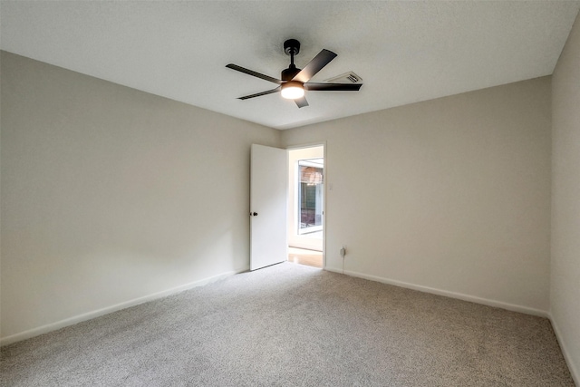 1319 E Brooklake Dr, Houston, TX 77077 - spare room featuring carpet floors, a ceiling fan, and baseboards