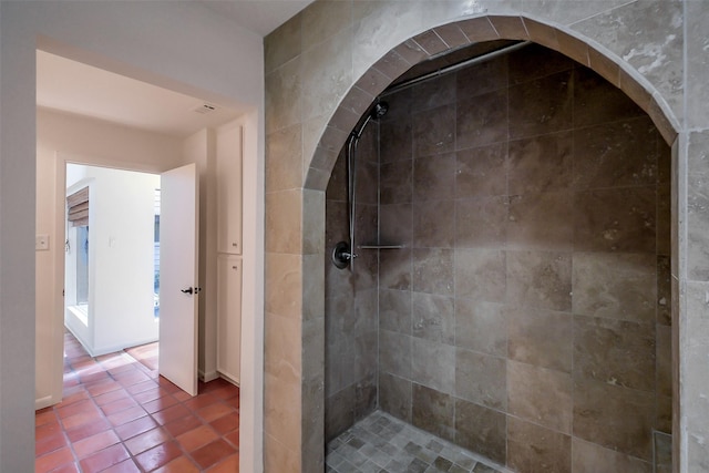 1319 E Brooklake Dr, Houston, TX 77077 - bathroom with a tile shower and tile patterned flooring