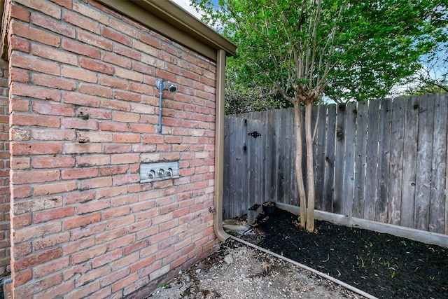 1319 E Brooklake Dr, Houston, TX 77077 - exterior details featuring brick siding and fence