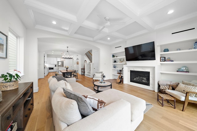 805 Fisher St Unit B, Houston, TX 77018 - living area with stairway, a fireplace, recessed lighting, arched walkways, and a ceiling fan