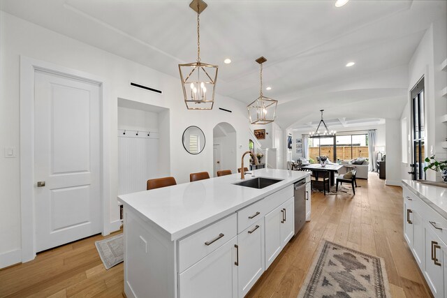 805 Fisher St Unit B, Houston, TX 77018 - kitchen with a sink, a chandelier, arched walkways, dishwasher, and open floor plan