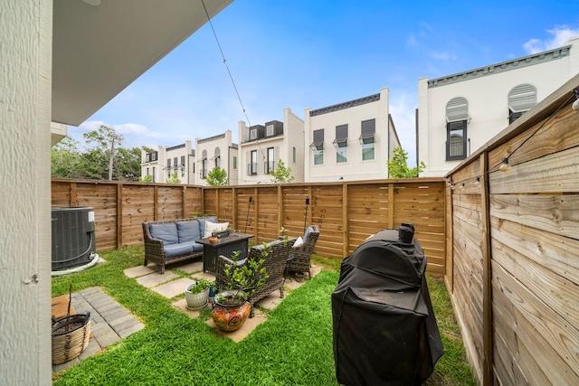 805 Fisher St Unit B, Houston, TX 77018 - fenced backyard featuring central AC, outdoor lounge area, and a residential view