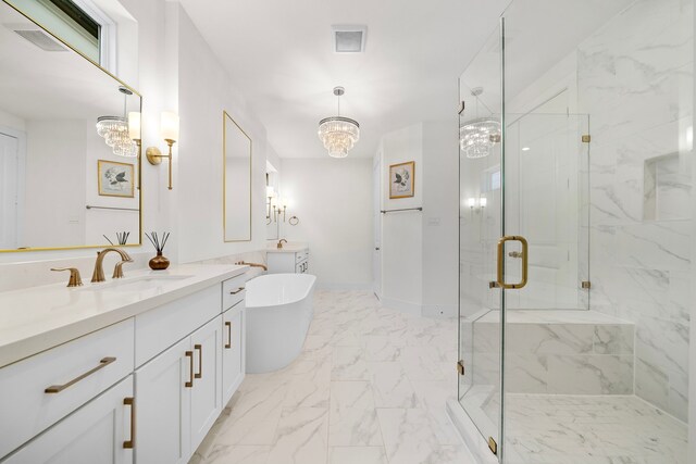 805 Fisher St Unit B, Houston, TX 77018 - full bath with a chandelier, vanity, marble finish floors, a marble finish shower, and a freestanding bath