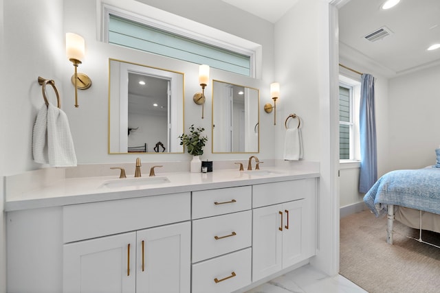 805 Fisher St Unit B, Houston, TX 77018 - ensuite bathroom with double vanity, recessed lighting, marble look tile flooring, and baseboards
