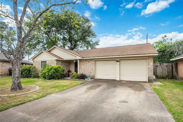 ranch-style home featuring a garage, driveway, fence, a front yard, and brick siding