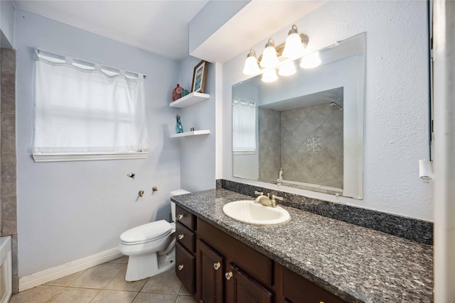 full bath with vanity, tile patterned floors, a shower, and toilet