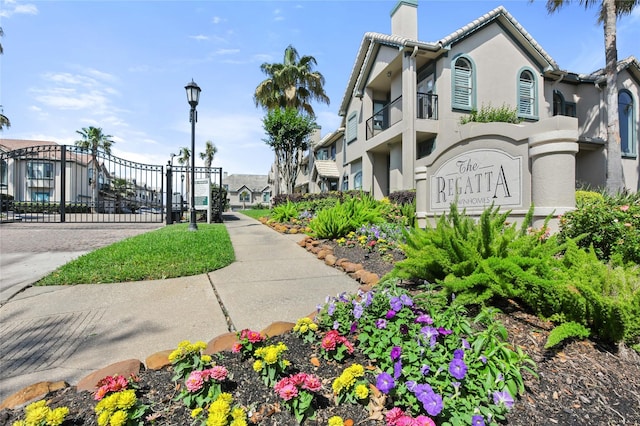 459 Mariners Dr, Kemah, TX 77565 - exterior space featuring a gate and a residential view