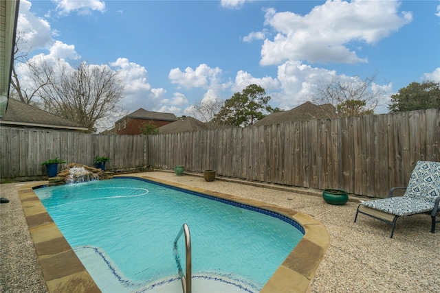 2104 Olympic Dr, League City, TX 77573 - view of pool featuring a fenced in pool and a fenced backyard