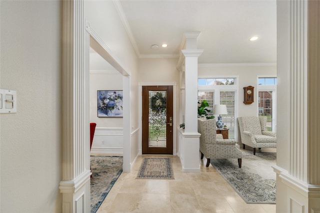 2104 Olympic Dr, League City, TX 77573 - entrance foyer with light tile patterned floors, ornamental molding, recessed lighting, and ornate columns