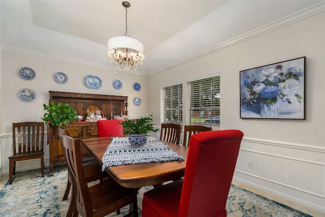 2104 Olympic Dr, League City, TX 77573 - dining room with an inviting chandelier and ornamental molding