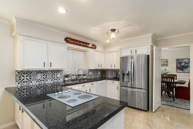 2104 Olympic Dr, League City, TX 77573 - kitchen with white cabinets, a peninsula, white appliances, and a sink