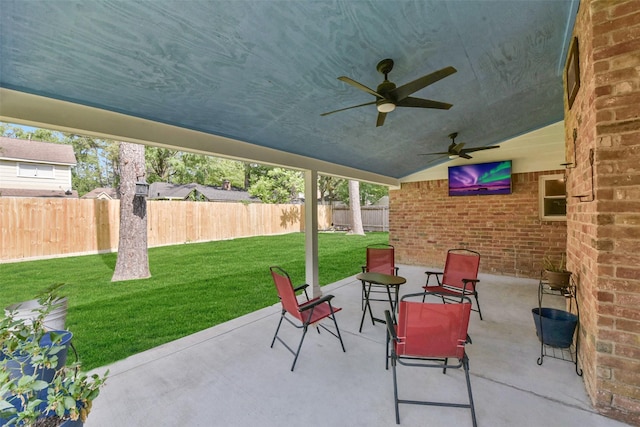 view of patio / terrace featuring a fenced backyard and ceiling fan