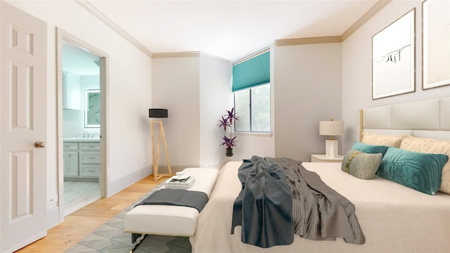 bedroom featuring light wood-style flooring, ensuite bath, a sink, and crown molding
