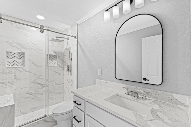 full bath featuring marble finish floor, a textured wall, toilet, vanity, and a marble finish shower