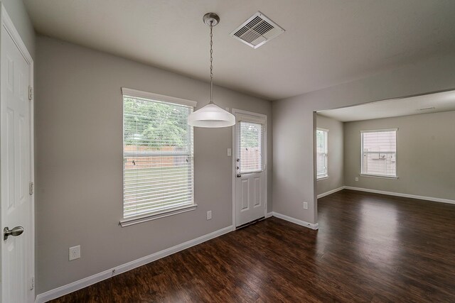 21423 Palma Grove Way, Houston, TX 77073 - foyer featuring plenty of natural light, baseboards, visible vents, and dark wood-style floors