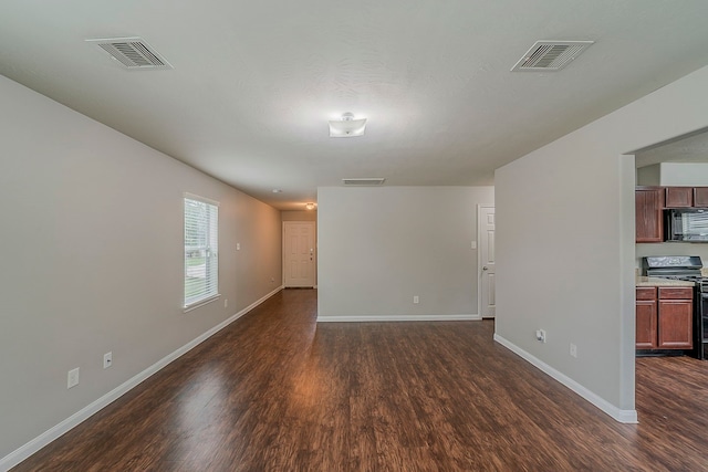 21423 Palma Grove Way, Houston, TX 77073 - empty room featuring dark wood-style flooring and visible vents