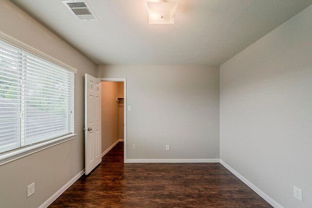 21423 Palma Grove Way, Houston, TX 77073 - unfurnished room with baseboards, wood finished floors, and visible vents