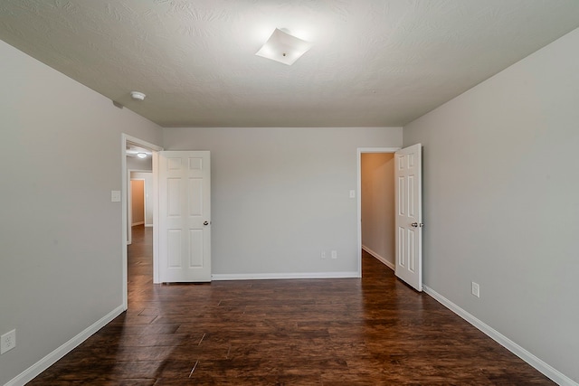 21423 Palma Grove Way, Houston, TX 77073 - unfurnished room with baseboards and wood finished floors