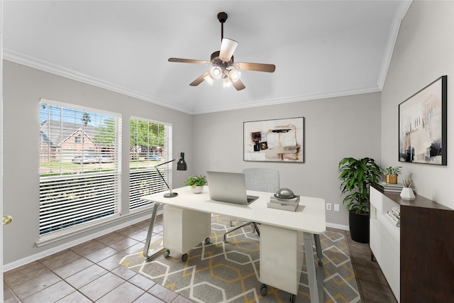 office space featuring dark tile patterned floors, ceiling fan, baseboards, and ornamental molding