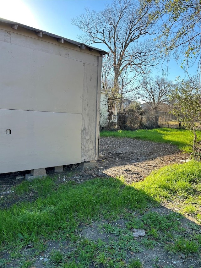 2406 Delano St, Houston, TX 77004 - view of home's exterior featuring fence, an outbuilding, and a storage shed