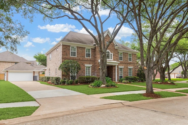 15 Rippling Creek Dr, Sugar Land, TX 77479 - colonial house with brick siding, a front lawn, and concrete driveway