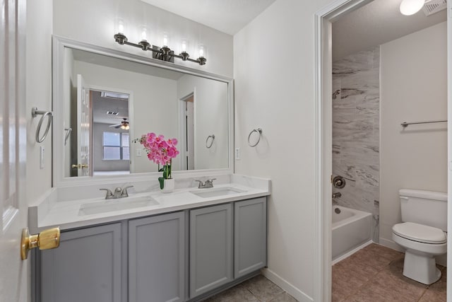 bathroom with tile patterned floors, visible vents, a sink, and toilet