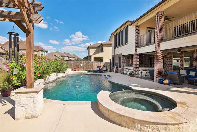 view of pool featuring ceiling fan, a fenced backyard, and a patio