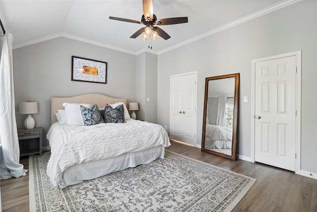 bedroom with wood finished floors, a ceiling fan, baseboards, and ornamental molding