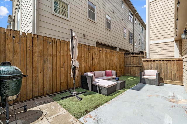 view of patio with a fenced backyard, an outdoor hangout area, and area for grilling