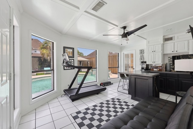 310 Yorkshire Ln, Port Neches, TX 77651 - interior space with a breakfast bar, plenty of natural light, visible vents, and coffered ceiling