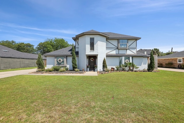 310 Yorkshire Ln, Port Neches, TX 77651 - view of front of house with brick siding and a front yard