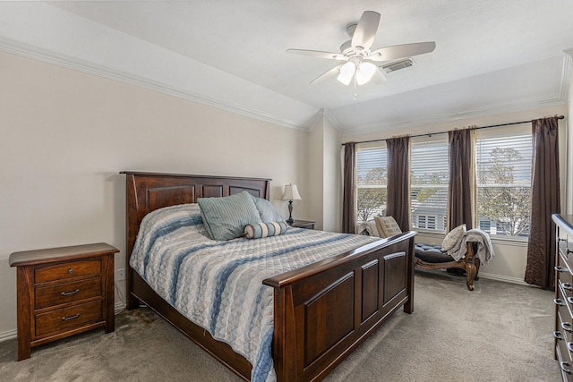 bedroom with baseboards, vaulted ceiling, crown molding, carpet floors, and visible vents