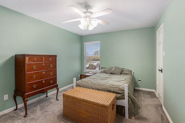 bedroom featuring carpet floors, baseboards, and a ceiling fan