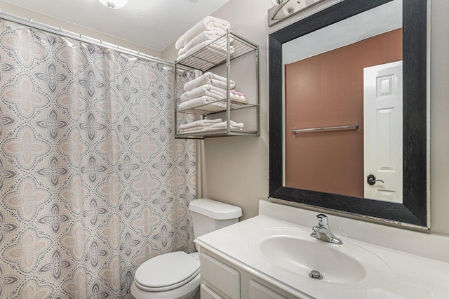 full bathroom with toilet, a shower with shower curtain, and vanity