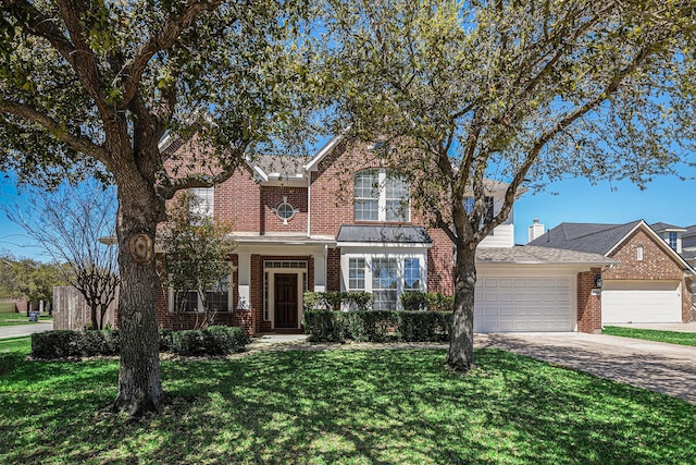 view of front of property with a front lawn, roof with shingles, driveway, brick siding, and a garage