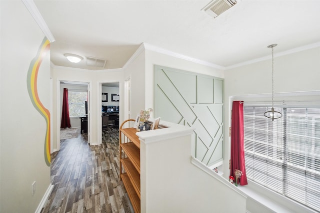 38 Wineberry Pl, The Woodlands, TX 77382 - hall with wood finished floors, ornamental molding, and baseboards