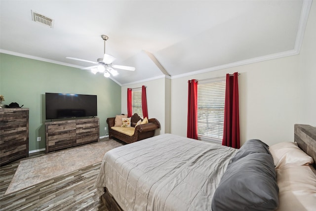38 Wineberry Pl, The Woodlands, TX 77382 - bedroom featuring vaulted ceiling, ornamental molding, wood finished floors, ceiling fan, and baseboards