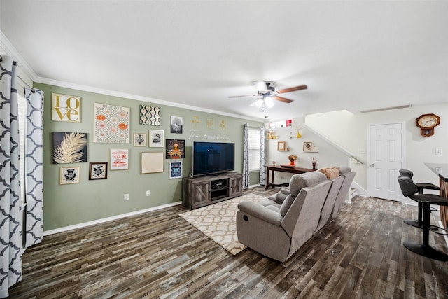 38 Wineberry Pl, The Woodlands, TX 77382 - living room featuring dark wood-style floors, a ceiling fan, crown molding, and baseboards