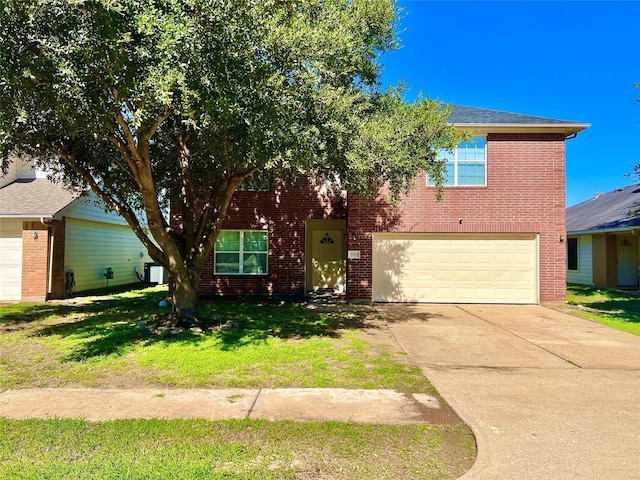 19334 Little Pine Ln, Katy, TX 77449 - view of front of house with a garage, brick siding, a front yard, and concrete driveway