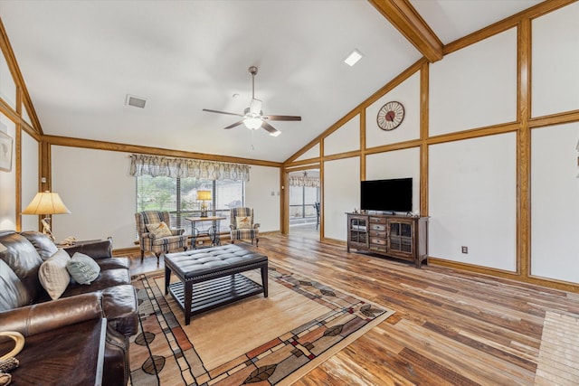 living area with high vaulted ceiling, baseboards, a ceiling fan, and wood finished floors