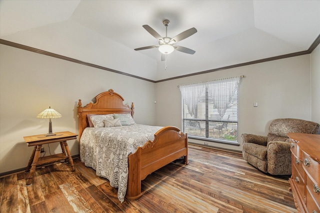 bedroom featuring crown molding, ceiling fan, wood finished floors, and lofted ceiling