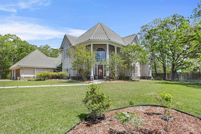 4304 Newcastle Ct, Bryan, TX 77802 - view of front of property with stucco siding and a tiled roof