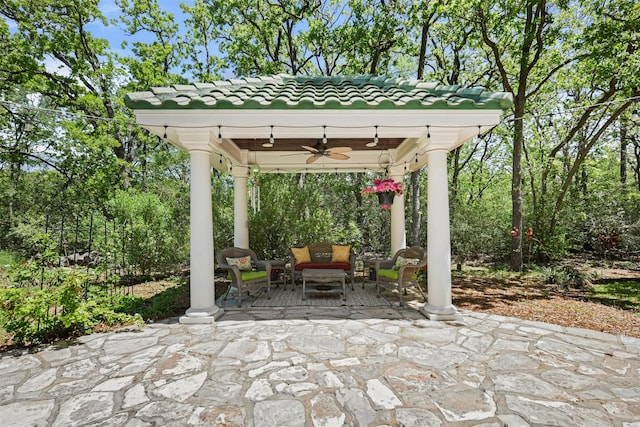 4304 Newcastle Ct, Bryan, TX 77802 - view of patio / terrace with a ceiling fan, outdoor lounge area, and view of scattered trees